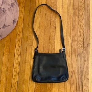 Black leather authentic vintage coach saddlebag